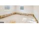 Unfinished basement featuring a blank canvas and natural light from windows at 6071 Cristie Dr, Ellenwood, GA 30294
