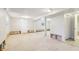 The unfinished basement offers a blank canvas with natural light and ample space for customization and expansion at 6071 Cristie Dr, Ellenwood, GA 30294