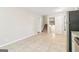 The spacious kitchen offers lots of counter space with stairs to the upper floor at 6071 Cristie Dr, Ellenwood, GA 30294