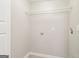 Empty room with electrical outlets and a wire shelf at 6071 Cristie Dr, Ellenwood, GA 30294
