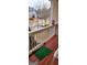 View from balcony with railing and front yard view of neighborhood at 1923 Manhattan Pkwy, Decatur, GA 30035