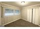 Neutral bedroom with plush carpet, and ample closet space, providing a cozy retreat at 3376 Brookfield Ln, Decatur, GA 30032