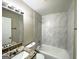 Updated bathroom with granite countertop, tiled shower and modern fixtures at 2683 Terratim Ln, Decatur, GA 30034