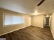 Cozy living room features hardwood floors, plenty of light and a neutral color palette at 2683 Terratim Ln, Decatur, GA 30034