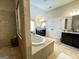 Luxurious bathroom featuring a soaking tub, tiled shower, double vanity and plenty of cabinet space at 39 Hannah Way, Palmetto, GA 30268