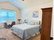 Comfortable bedroom with a cozy bed, natural light, and a functional workspace at 39 Hannah Way, Palmetto, GA 30268