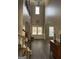 Inviting foyer with hardwood floors, a staircase, and a double-door entryway, creating a grand entrance at 39 Hannah Way, Palmetto, GA 30268