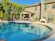 Backyard swimming pool with an inviting patio area, complete with comfortable seating and outdoor dining options at 39 Hannah Way, Palmetto, GA 30268