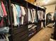 Spacious walk-in closet with custom shelving, hanging rods, and ample storage space at 39 Hannah Way, Palmetto, GA 30268