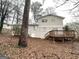 Two-story home featuring a deck in a spacious backyard at 2296 Aurie Dr, Decatur, GA 30034