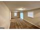 Spacious carpeted basement with natural light from windows and sliding glass door at 2296 Aurie Dr, Decatur, GA 30034