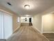Finished basement area providing access to the kitchen via carpeted stairs at 2296 Aurie Dr, Decatur, GA 30034