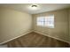 Cozy carpeted bedroom with neutral color and a window at 2296 Aurie Dr, Decatur, GA 30034