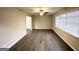 Bright living room with neutral walls, modern vinyl floors, and large window with natural light at 2296 Aurie Dr, Decatur, GA 30034