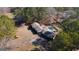 Sprawling property featuring brick home with a large pool and a spacious backyard surrounded by mature trees at 160 Appalachee Church Rd, Auburn, GA 30011