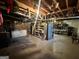 Storage basement area with shelves, an exposed ceiling, and concrete flooring at 160 Appalachee Church Rd, Auburn, GA 30011