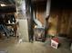 Basement featuring mechanical equipment, storage, and potential for renovation at 160 Appalachee Church Rd, Auburn, GA 30011