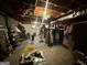 Unfinished basement area with exposed ceiling and ample storage capacity at 160 Appalachee Church Rd, Auburn, GA 30011