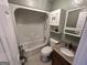 Bathroom featuring a vanity, medicine cabinet and combination shower-tub at 160 Appalachee Church Rd, Auburn, GA 30011