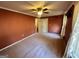 Spacious bedroom featuring a ceiling fan, carpet flooring, and a double door closet at 160 Appalachee Church Rd, Auburn, GA 30011