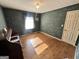 Bedroom with hardwood floors and natural light from window at 160 Appalachee Church Rd, Auburn, GA 30011