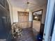 The entryway shows hardwood floors and a wooden closet, with views to the kitchen at 160 Appalachee Church Rd, Auburn, GA 30011