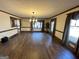 Living Room with wood floors and natural light from many windows at 160 Appalachee Church Rd, Auburn, GA 30011