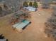 Expansive property featuring a home, outbuilding and a large, open yard at 382 Lamb Rd, Moreland, GA 30259