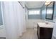 Bathroom with shower/tub combo and single vanity at 382 Lamb Rd, Moreland, GA 30259