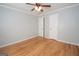 Bedroom featuring hardwood floors and two doors at 382 Lamb Rd, Moreland, GA 30259