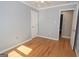 Bedroom featuring hardwood floors, two windows and a ceiling fan at 382 Lamb Rd, Moreland, GA 30259