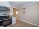 Clean kitchen with stainless steel appliances and granite countertops at 382 Lamb Rd, Moreland, GA 30259