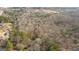 Expansive aerial view of a heavily wooded lot showcasing its natural setting and potential at 116 Appalachee Church Rd, Auburn, GA 30011