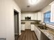 Bright kitchen featuring stainless steel appliances, granite countertops and white cabinets at 2343 Deer Pass Way, Decatur, GA 30035