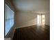 Bright living room with newly installed wood floors and plenty of natural light at 2343 Deer Pass Way, Decatur, GA 30035