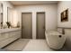 Modern bathroom featuring a soaking tub, double vanity, and contemporary fixtures with neutral tones and clean lines at 330 Campground Rd, Mcdonough, GA 30253
