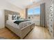 Cozy bedroom featuring a comfortable bed, ample natural light, and a soothing color scheme for restful nights at 130 Glasgow Ln, Fayetteville, GA 30214