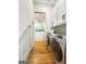 Convenient laundry room with washer, dryer, and ample storage space at 130 Glasgow Ln, Fayetteville, GA 30214
