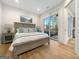 Serene main bedroom with an ensuite bathroom and patio access at 130 Glasgow Ln, Fayetteville, GA 30214