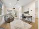 Bright office with a desk, chair, and a comfortable recliner providing a functional and inviting workspace at 130 Glasgow Ln, Fayetteville, GA 30214