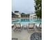 Resort-style pool with lounge chairs and ample space for relaxation and recreation at 130 Glasgow Ln, Fayetteville, GA 30214