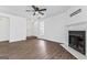 Bright living room features a fireplace, wood floors, and large window with great natural light at 360 Black Oak Sw Ct, Marietta, GA 30008