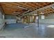 Large unfinished basement with open ceiling and concrete floor, offering potential for future expansion at 185 Redwood Cir, Fayetteville, GA 30214