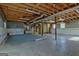 Spacious unfinished basement with exposed ceiling, offering potential for customization and ample storage at 185 Redwood Cir, Fayetteville, GA 30214