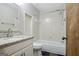 Bathroom with granite vanity top, shower and tub at 185 Redwood Cir, Fayetteville, GA 30214