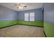 Bedroom featuring carpet and two tone color scheme at 185 Redwood Cir, Fayetteville, GA 30214
