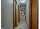 Neutral hallway with multiple doorways and carpet at 185 Redwood Cir, Fayetteville, GA 30214