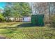 Exterior view of the two utility sheds offering extra storage in the spacious yard at 185 Redwood Cir, Fayetteville, GA 30214