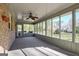 Bright sun room with large windows providing views of the fenced backyard at 185 Redwood Cir, Fayetteville, GA 30214