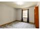 Bright bedroom with a window and carpet floors at 2278 Honeysuckle Se Ln, Smyrna, GA 30080